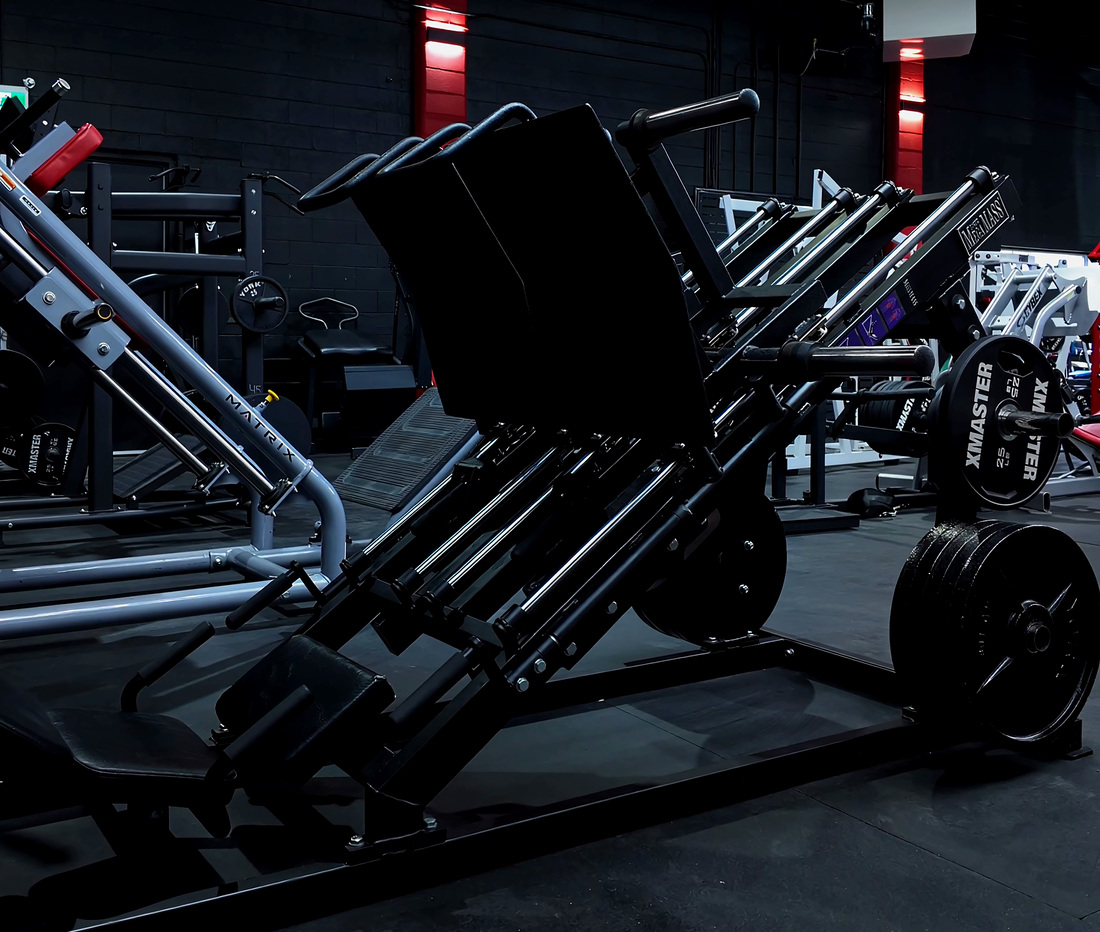 MEGAMASS plate-loaded leg press at Legacy Athletix