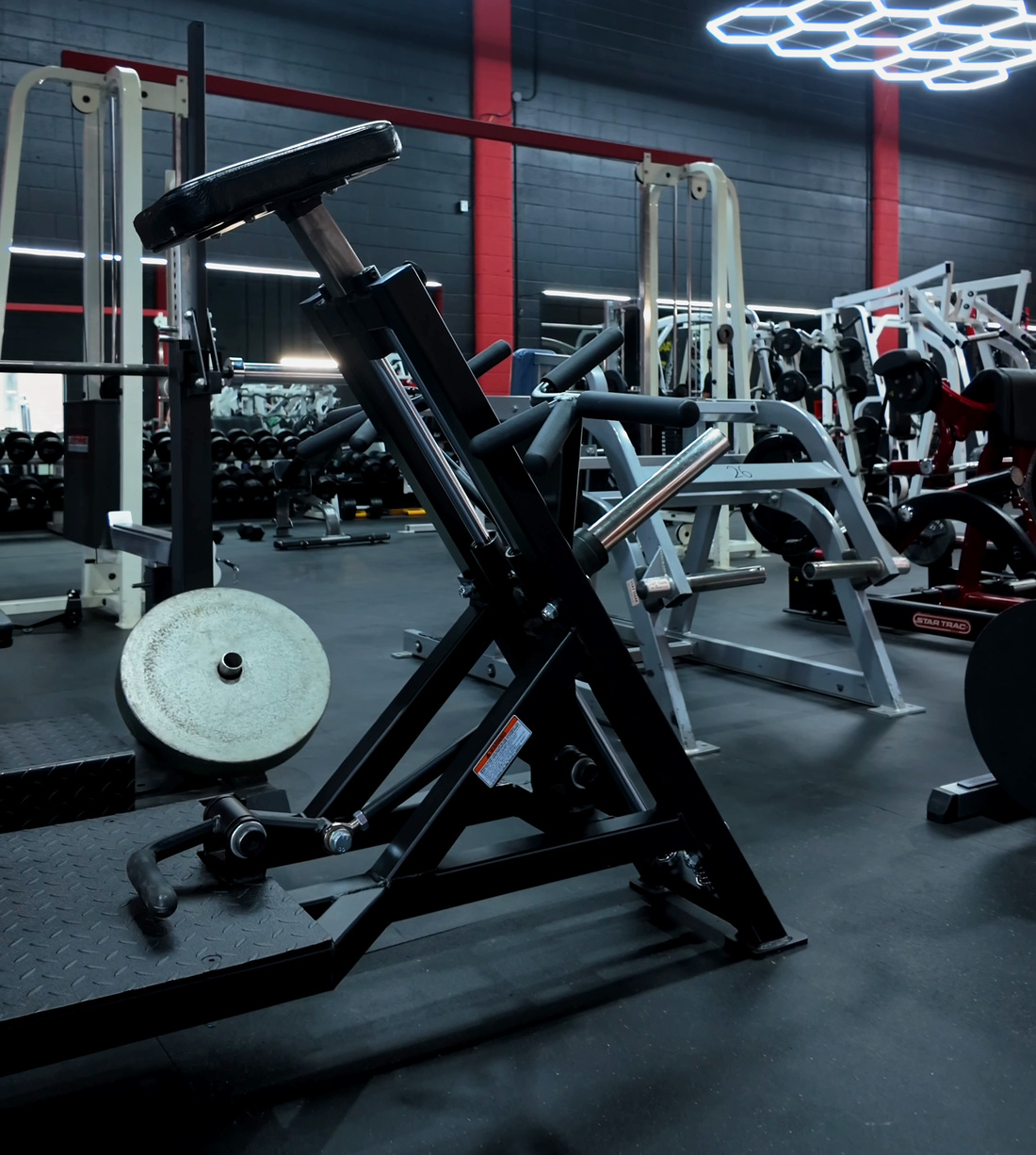 Black plate-loaded chest-supported T-Bar Row at Legacy Athletix
